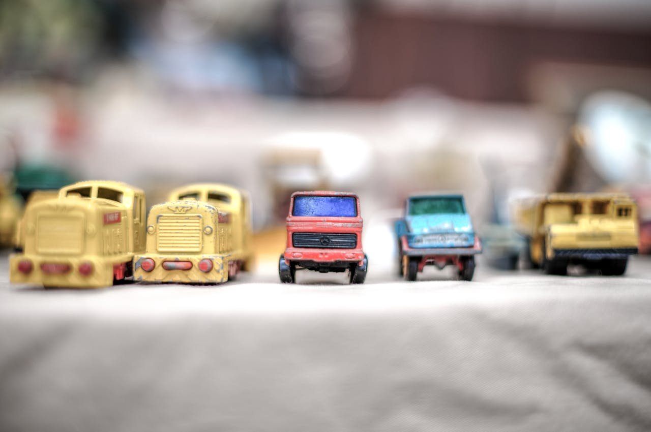 Menu Colorful vintage toy cars in focus showcasing shallow depth of field.